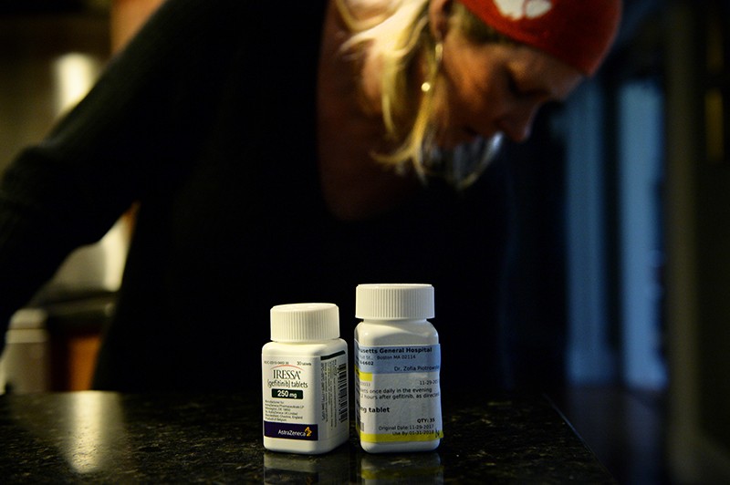 A woman with her cancer medication