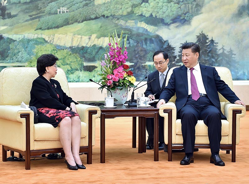 Xi Jinping talks with Margaret Chan
