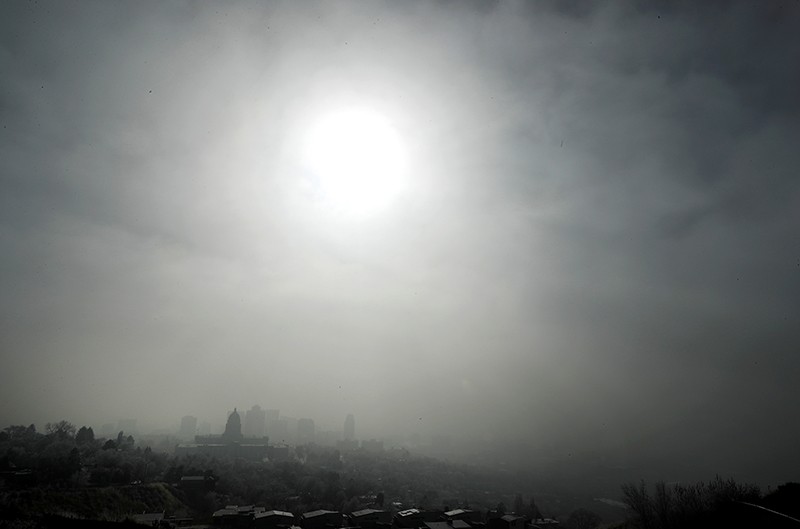 The Utah State Capitol is shrouded in smog in downtown Salt Lake City.